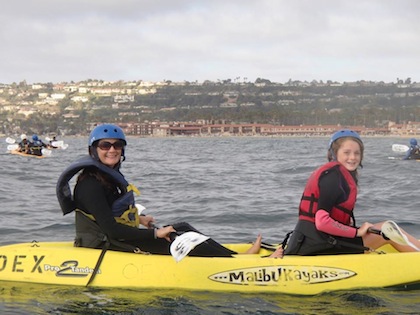 adult and child kayaking
