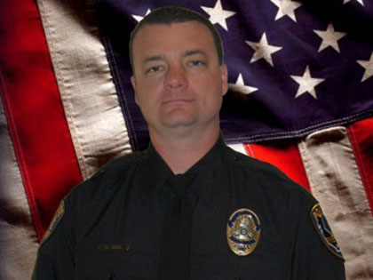 Officer Michael Crain, an 11-year veteran of the force, was shot and killed allegedly by Christopher Dorner on Feb. 7, 2013. (credit: Riverside Police Department)