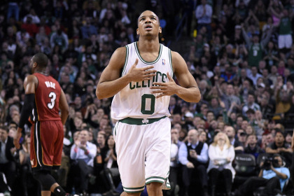 BOSTON, MA - MARCH 19: Avery Bradley #0 of the Boston Celtics celebrates after a play against the Miami Heat on March 19, 2014 at the TD Garden in Boston, Massachusetts.  NOTE TO USER: User expressly acknowledges and agrees that, by downloading and or using this photograph, User is consenting to the terms and conditions of the Getty Images License Agreement. Mandatory Copyright Notice: Copyright 2014 NBAE  (Photo by Brian Babineau/NBAE via Getty Images)