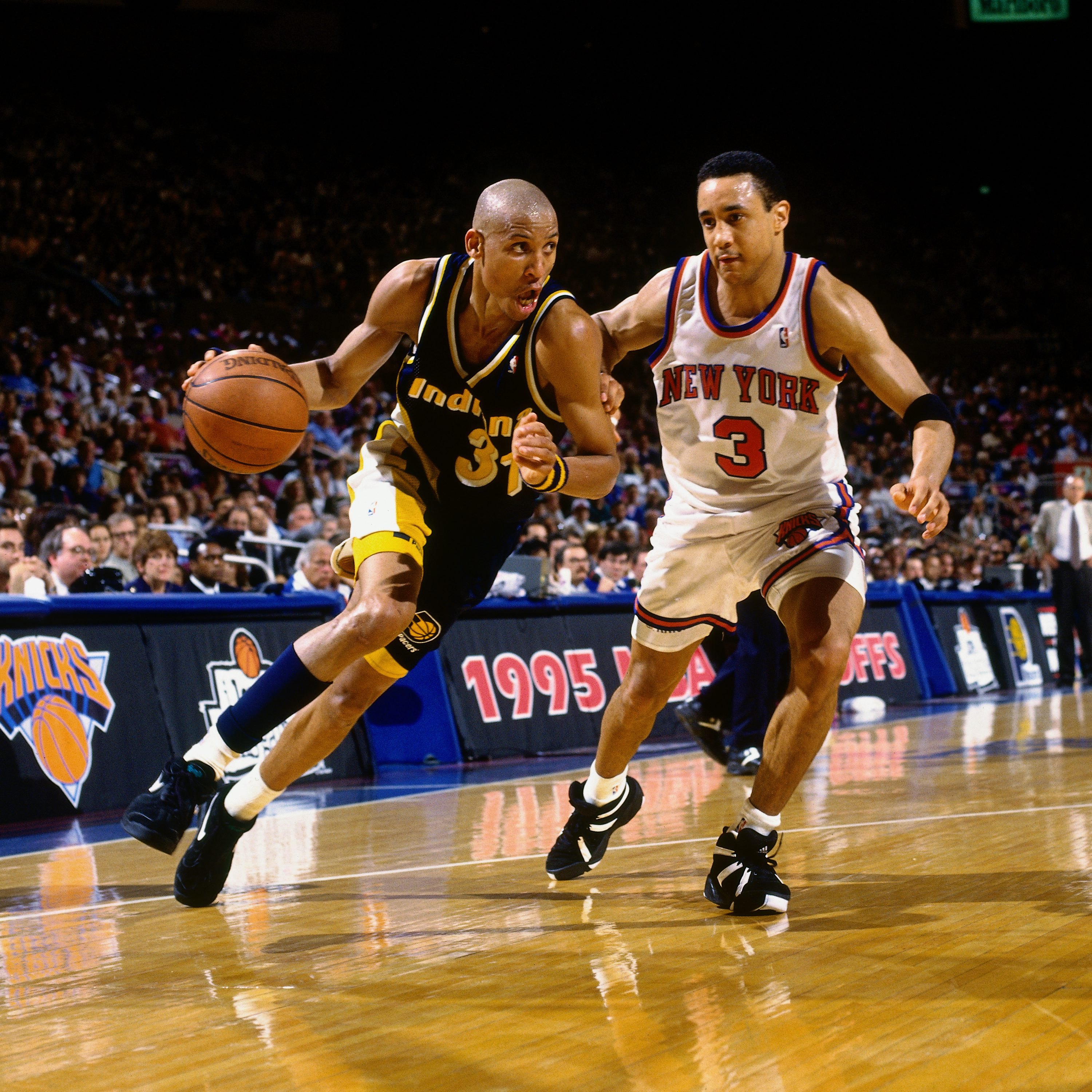 Reggie Miller #31 of the Indiana Pacers drives to the basket against John Starks #3 of the New York Knicks in Game Seven of the 1995 Eastern Conference Semifinals played on May 21, 1995 at Madison Square Garden in New York, New York. (credit: Nathaniel S. Butler/NBAE via Getty Images)