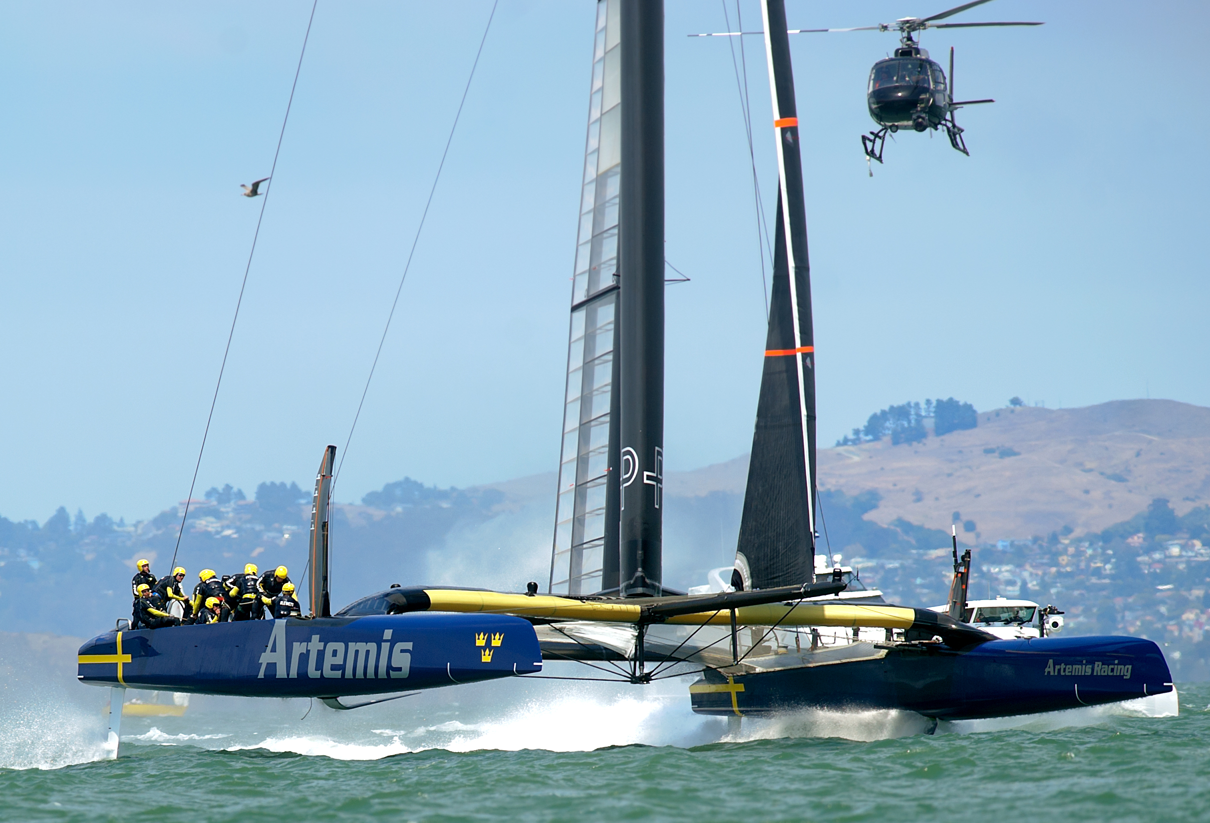 Sweden's Artemis Racing approaches the finish line while racing Italy's Luna Rossa Challenge in a Louis Vuitton Cup semi-finals match on August 6, 2013, in San Francisco. Artemis, sailing its first race since a May 9 capsize killed crewman Andrew 'Bart' Simpson, lost to the Italian team by just under two minutes. (credit: Noah Berger/AFP/Getty Images)