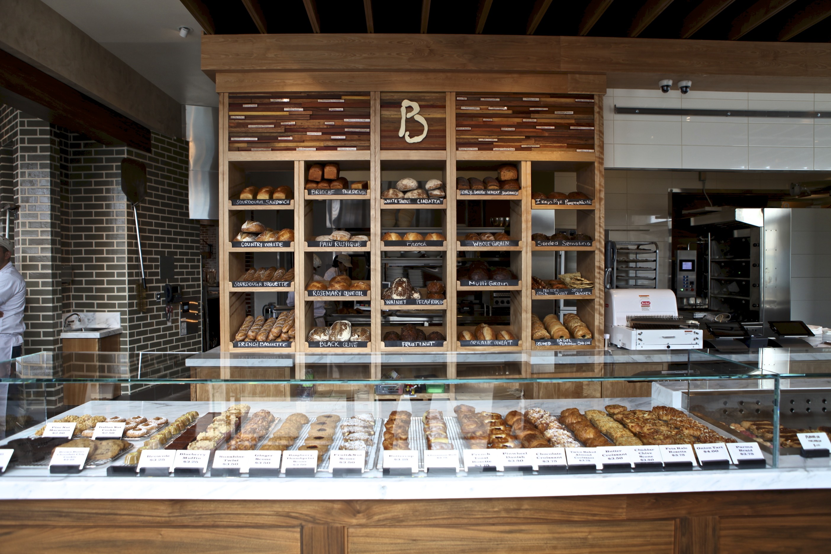 https://denver.cbslocal.com/wp-content/uploads/sites/14984641/2015/02/cafe-opening_bread-wall-and-pastry-case1.jpg