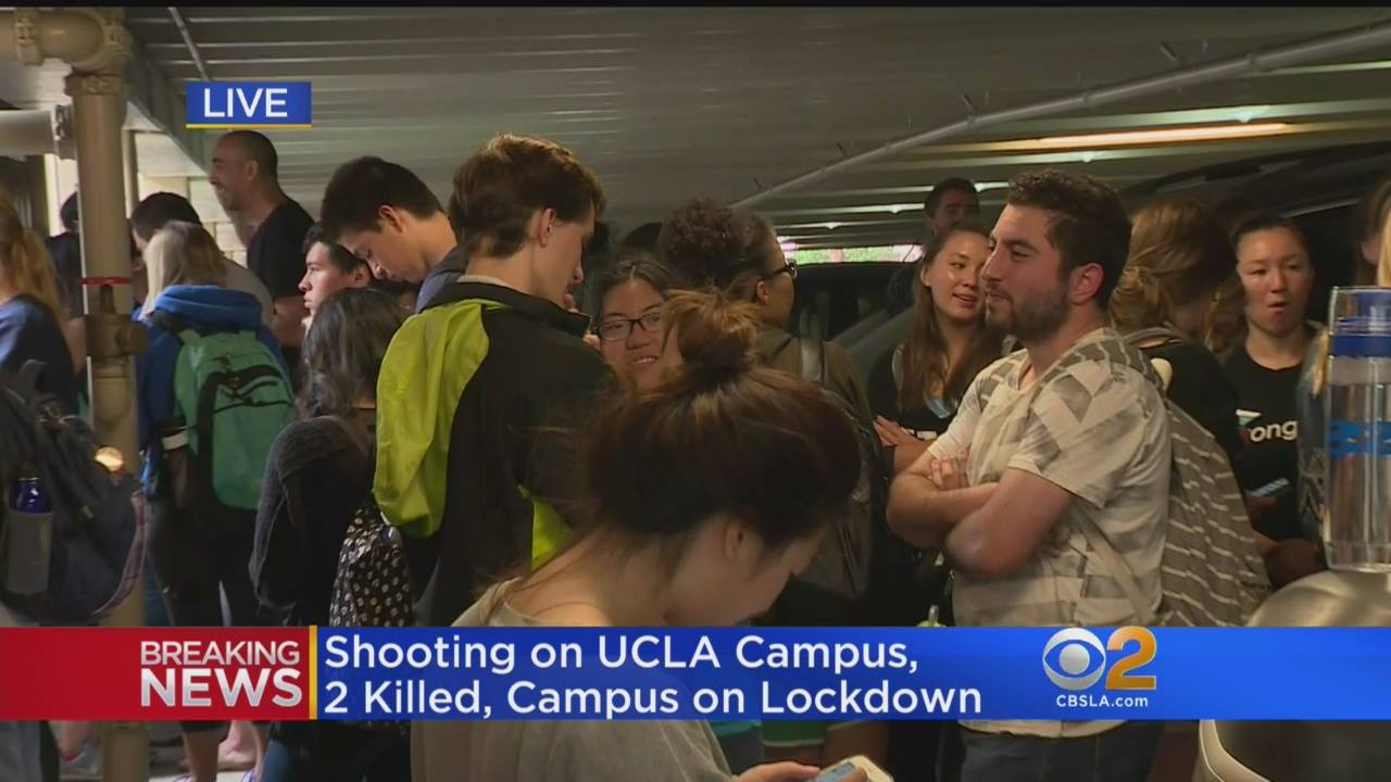 UCLA students huddle in a garage amid a campus-wide lockdown