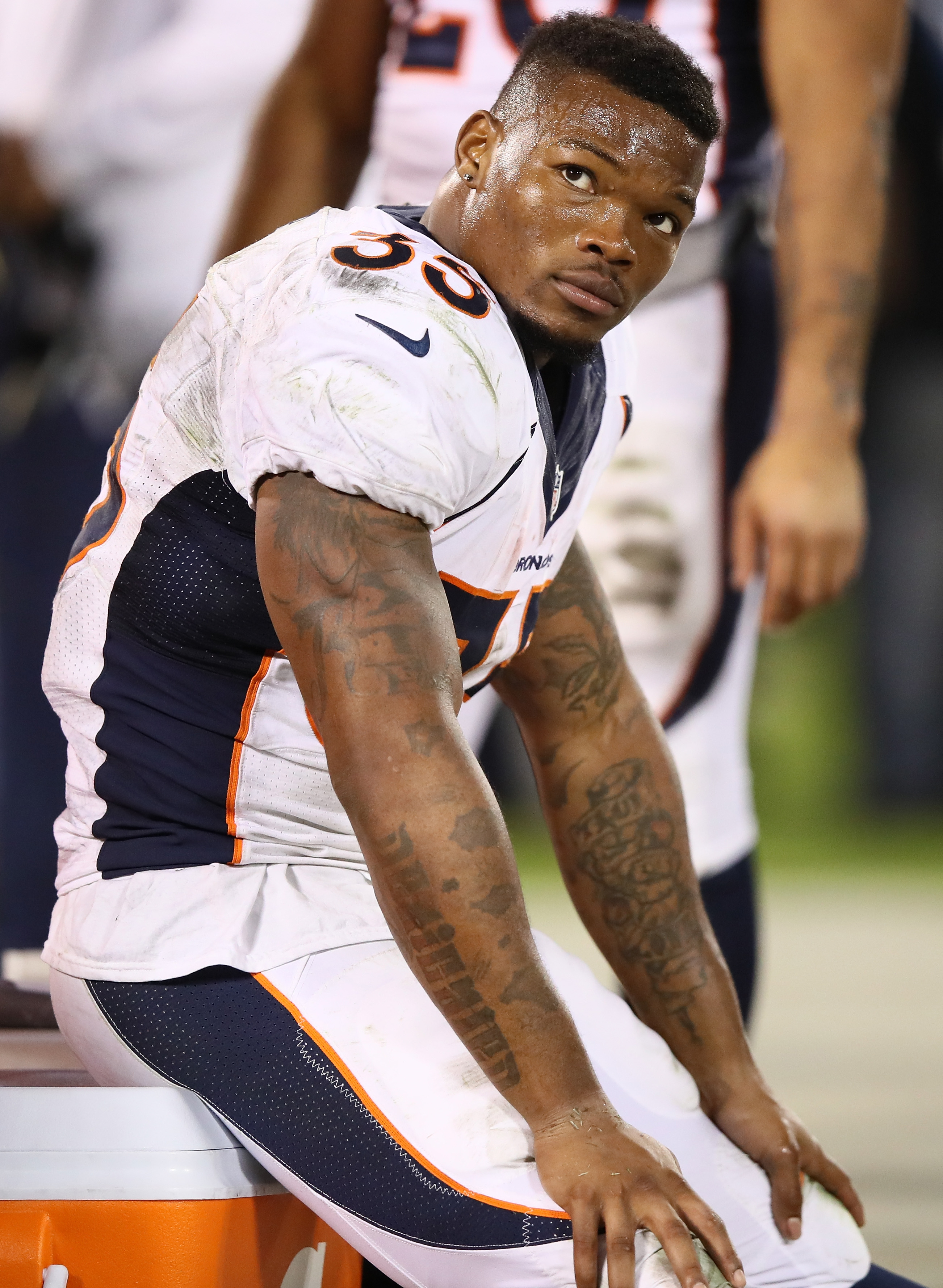 Kapri Bibbs #35 of the Denver Broncos reacts on the bench after losing to the Oakland Raiders at Oakland-Alameda County Coliseum on November 6, 2016 in Oakland, California. (Photo by Ezra Shaw/Getty Images)