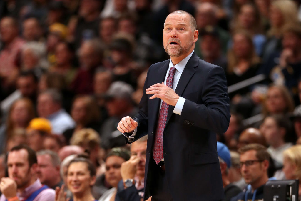 Head coach Michael Malone of the Denver Nuggets instructs his team as they play the Brooklyn Nets at the Pepsi Center on November 9, 2018 in Denver, Colorado.