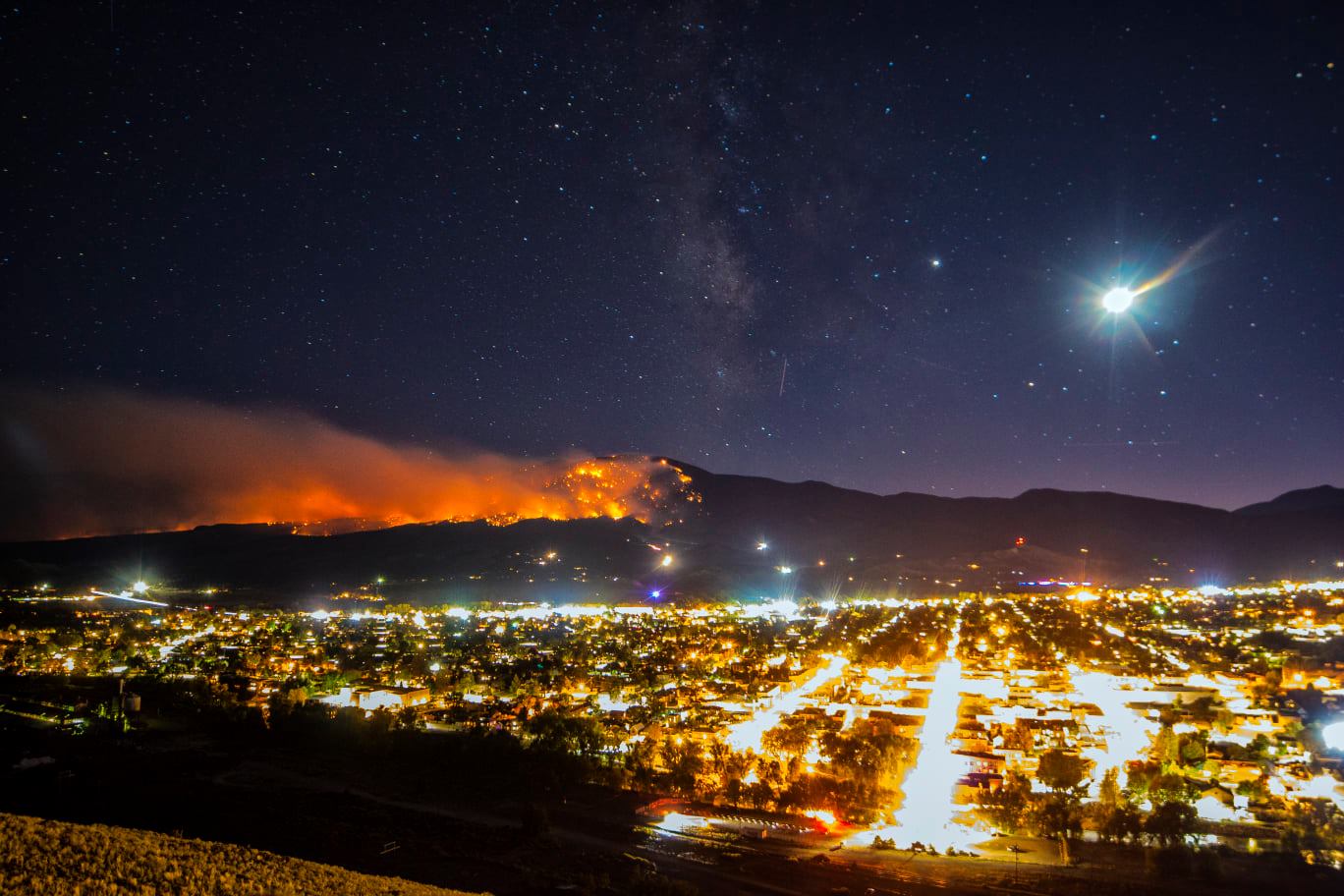 An image of the Decker Fire at night showing Salida in the foreground