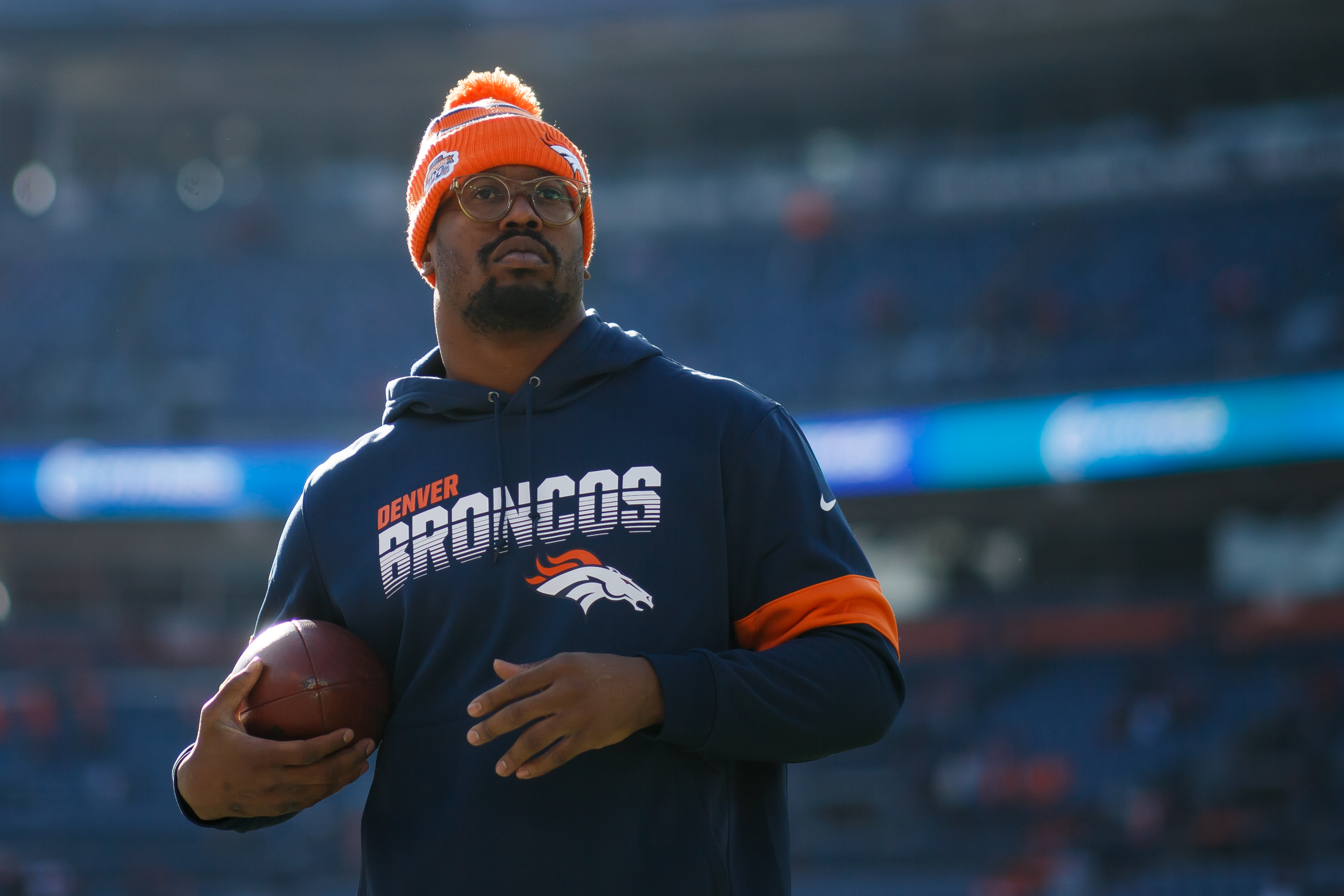 Linebacker Von Miller of the Denver Broncos stands on the field during warmups before a game against the Los Angeles Chargers at Empower Field at Mile High on December 1, 2019.