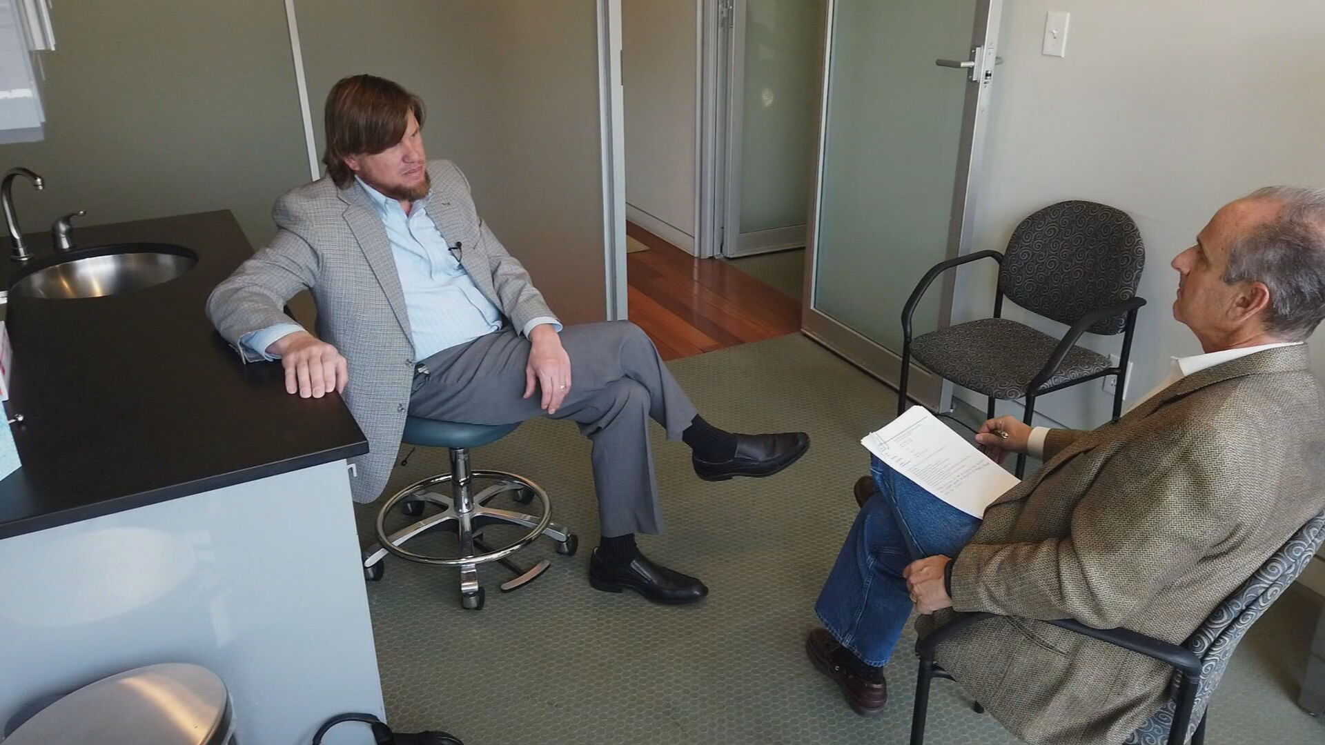 CBS4 Investigator Brian Maass speaking with Dr. Brian Willoughby (credit: CBS)