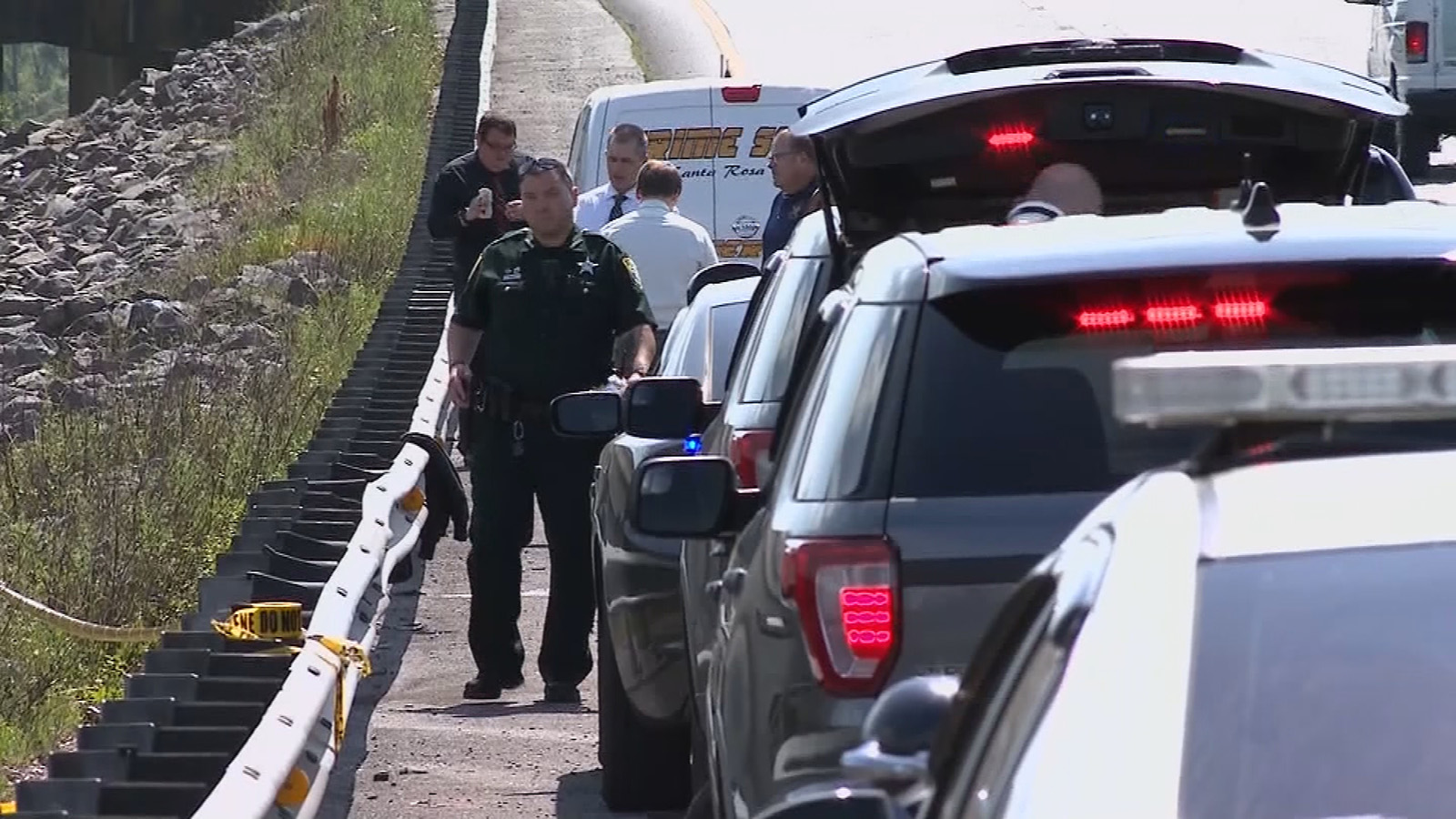 Police at the scene where Gannon Stauch's body was found in Florida