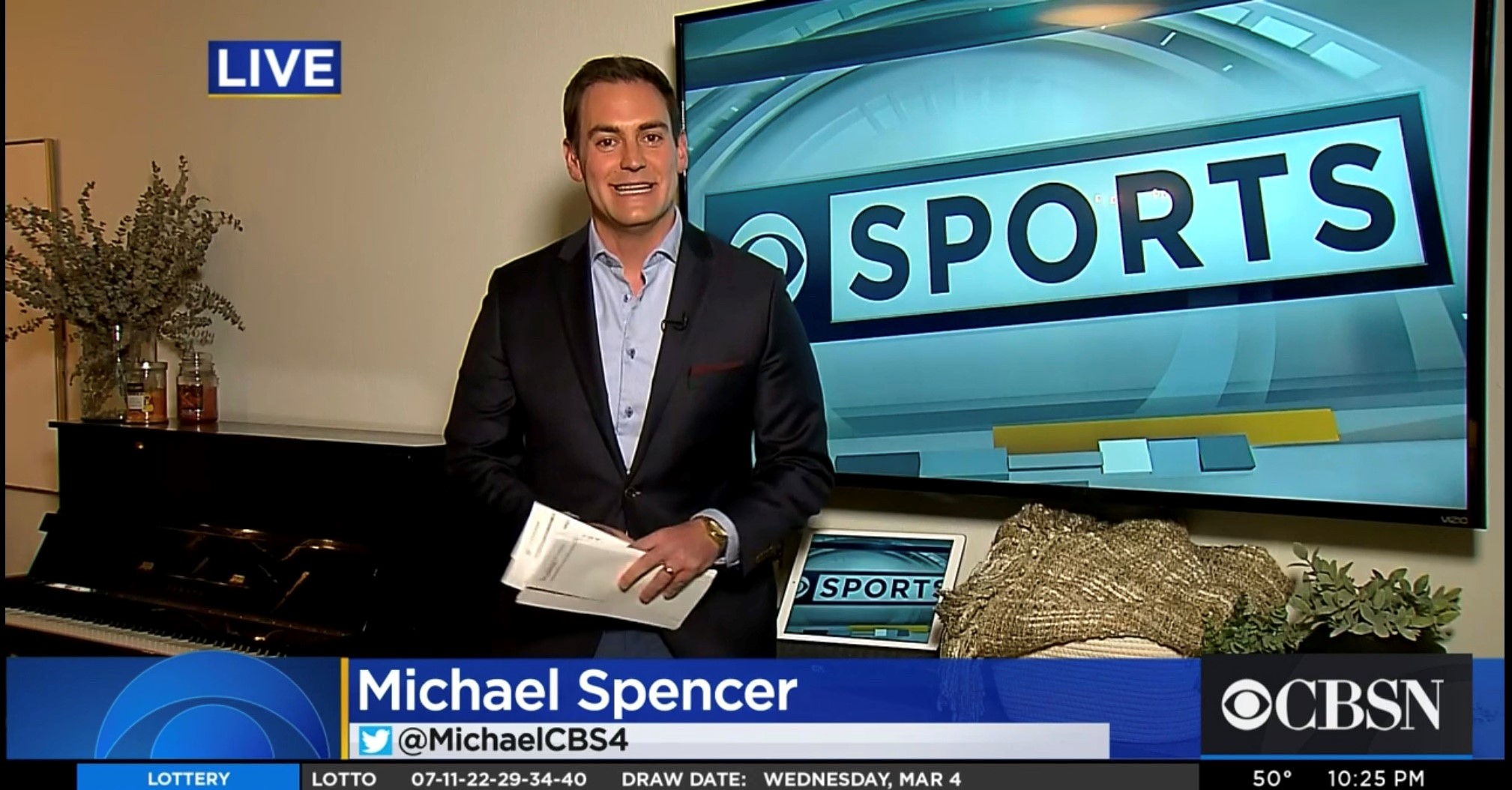 Michael Spencer reports on sports news during a CBS4 newscast.