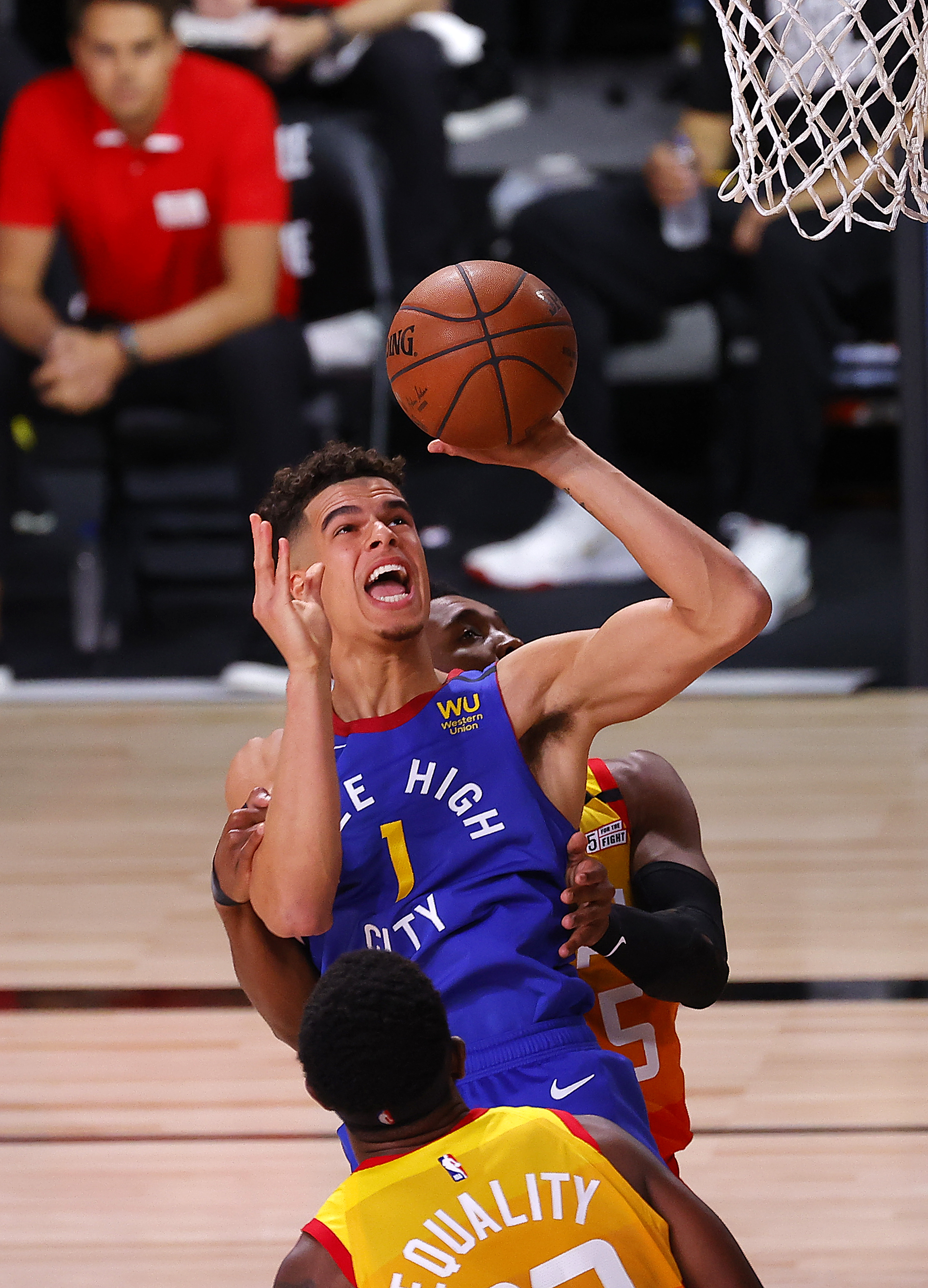 Michael Porter Jr. of the Denver Nuggets drives to the basket during the first quarter against the Utah Jazz at The Arena at ESPN Wide World Of Sports Complex on Aug. 8, 2020.