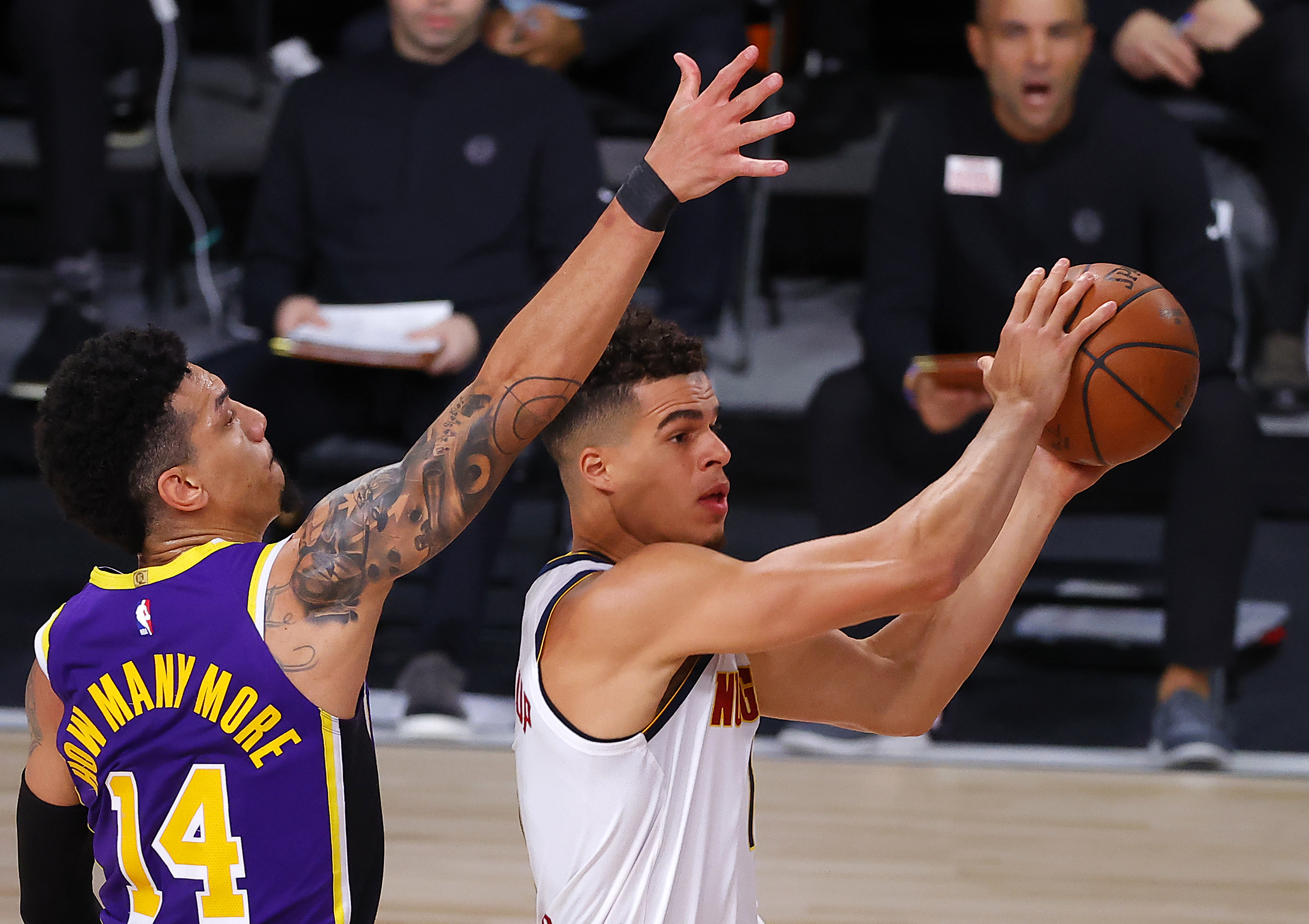 Michael Porter Jr. of the Denver Nuggets drives the ball against Danny Green of the Los Angeles Lakers during the 2020 NBA Playoffs at AdventHealth Arena at the ESPN Wide World Of Sports Complex on September 26, 2020.