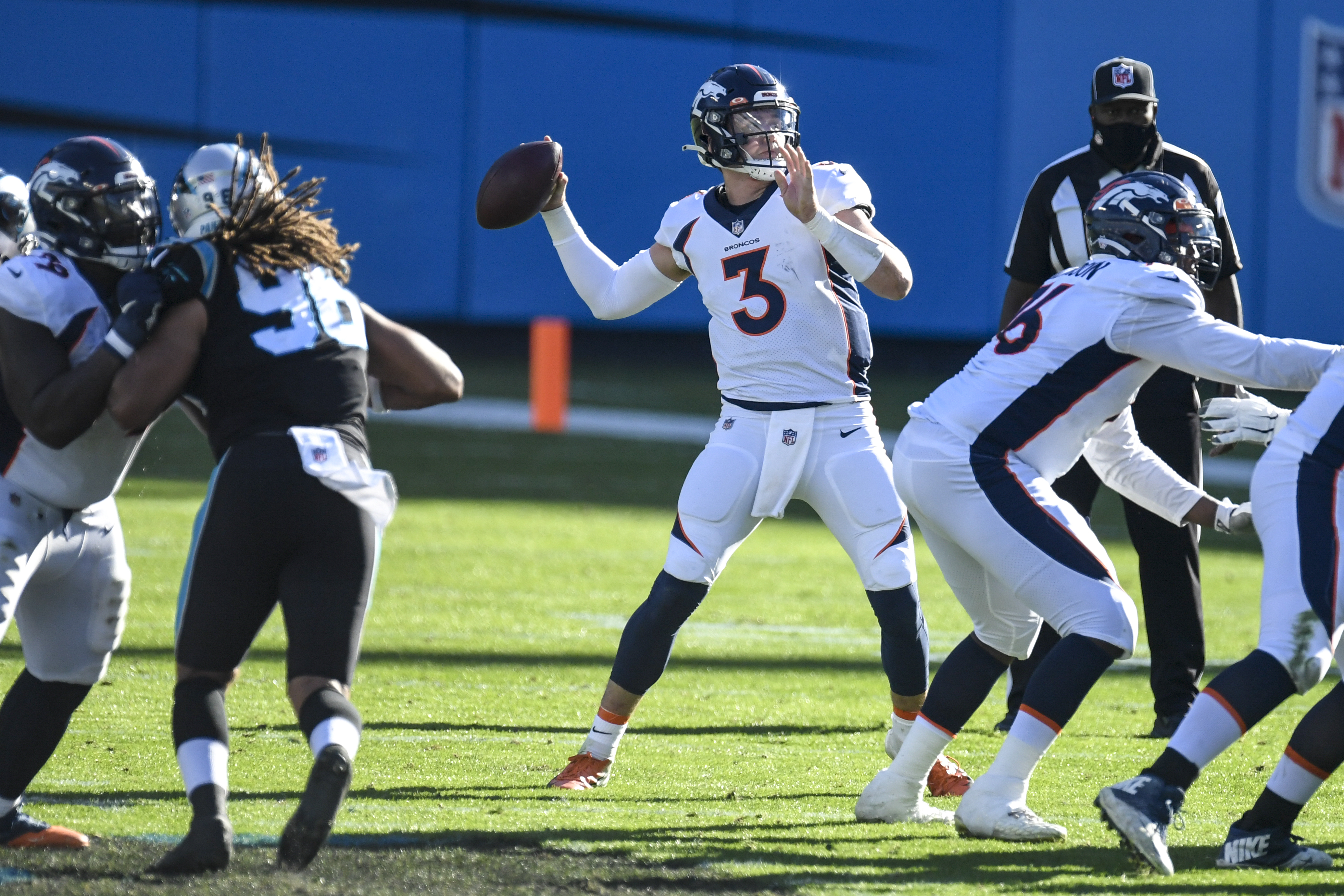 Drew Lock of the Denver Broncos throws against the Carolina Panthers at Bank of America Stadium on Dec. 13, 2020.