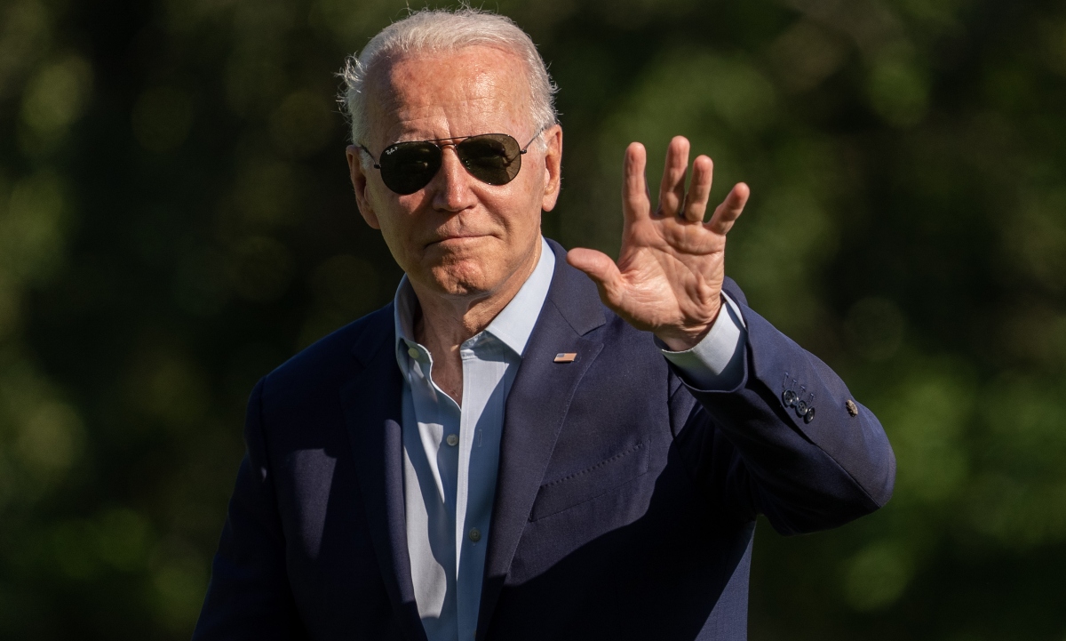 U.S. President Joe Biden waves while walking on the South Lawn of the White House after arriving on Marine One in Washington, D.C., U.S., on Tuesday, June 29, 2021. Biden and the Democratic Party are facing major political challenges in farming regions like the rolling pasture land of southwest Wisconsin, where he travelled today to promote a bipartisan deal on infrastructure that would have benefits for agriculture and rural America.