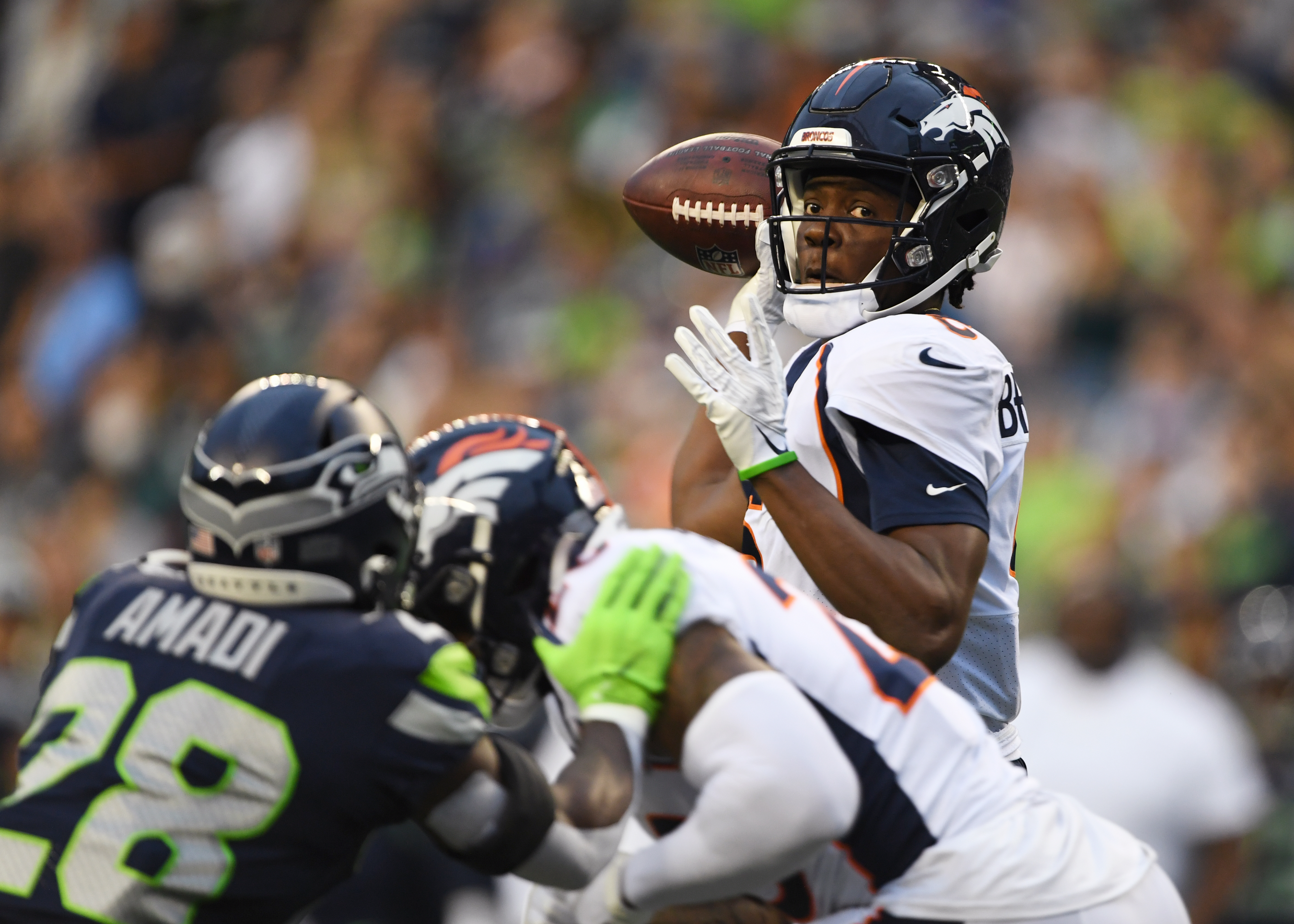 Denver Broncos quarterback Teddy Bridgewater throws a touchdown pass early in the game at Lumen Field on August 21, 2021 in Seattle.