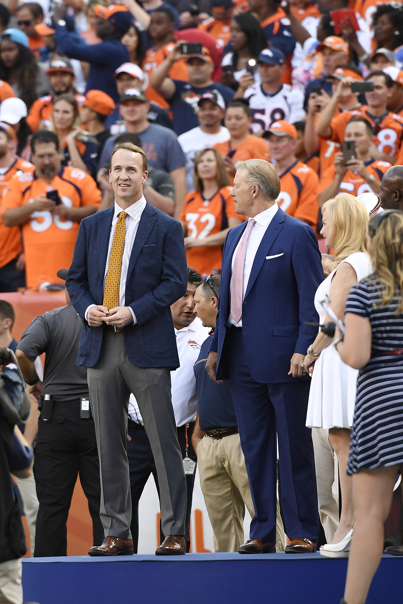 Former Broncos quarterbacks and Super Bowl Champions Peyton Manning and John Elway during a ceremony honoring the franchise's three Super Bowl titles on Sept. 8, 2016, in Denver.