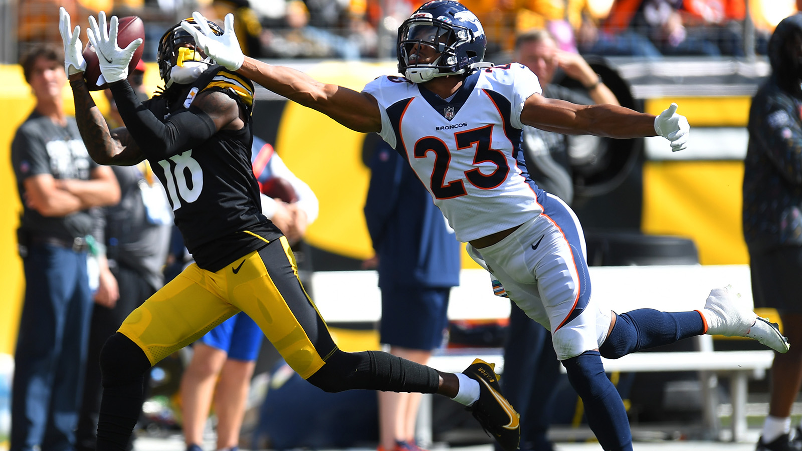 Diontae Johnson of the Pittsburgh Steelers catches a 50-yard touchdown pass from Ben Roethlisberger against the Denver Broncos during the first quarter at Heinz Field on Oct. 10, 2021.