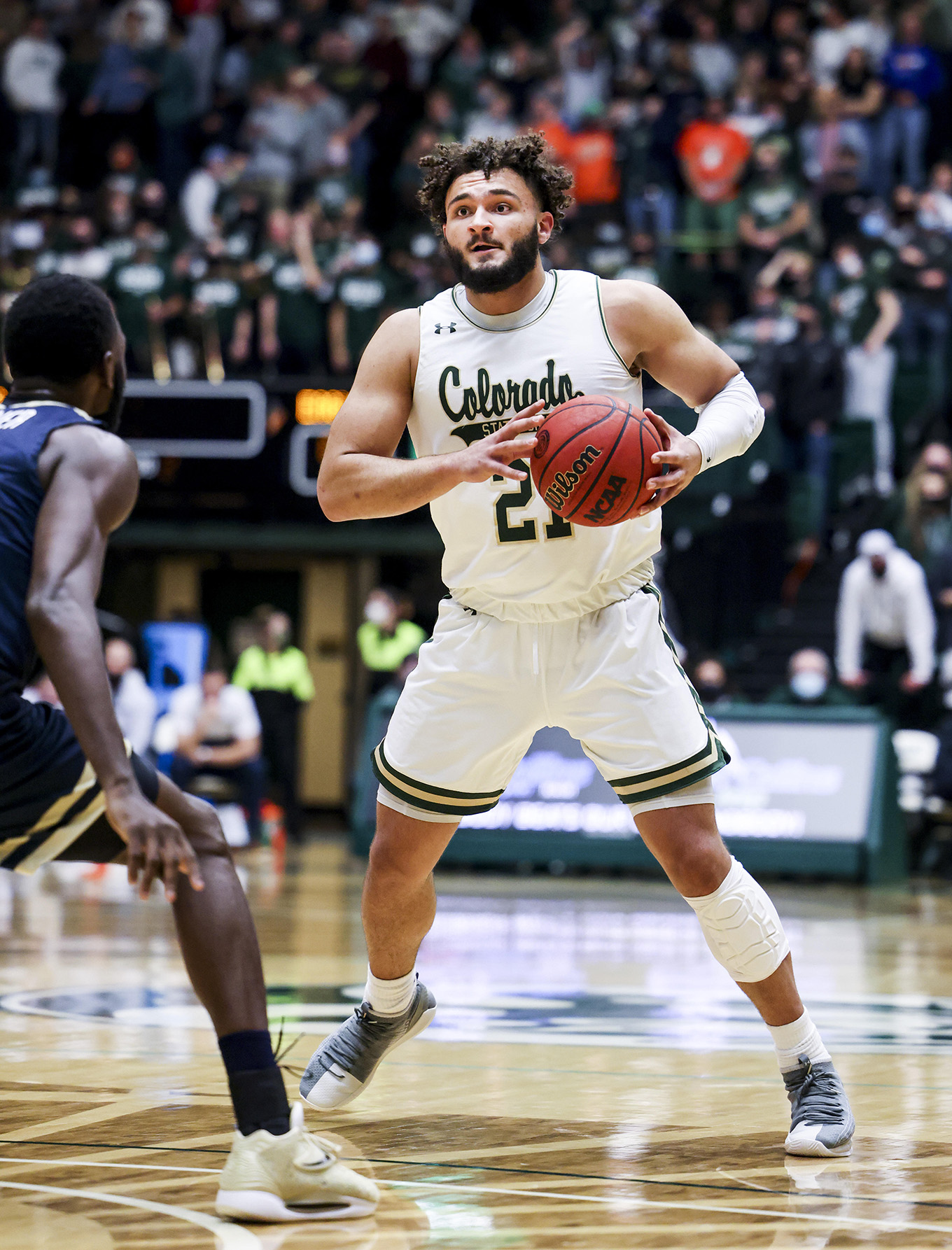 David Roddy of the Colorado State Rams looks for a pass against the Oral Roberts Golden Eagles at Moby Arena on November 9, 2021 in Fort Collins, Colorado.