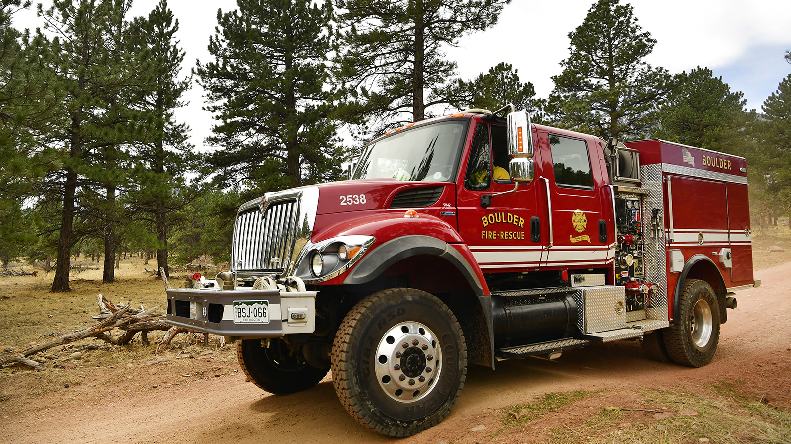 A Boulder Fire and Rescue engine heads towards the NCAR fire as it continues to burn in the foothills south of the National Center for Atmospheric Research on March 27, 2022 in Boulder.