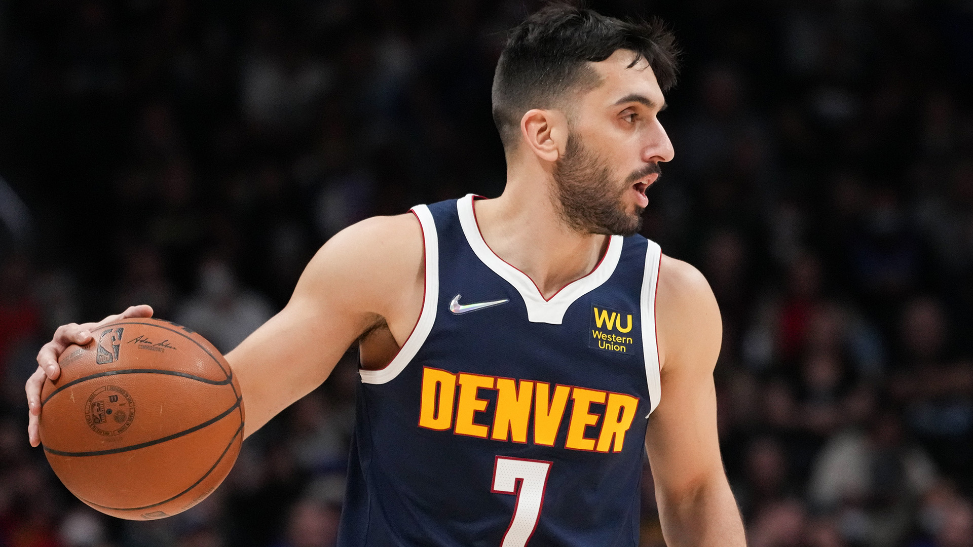 Facundo Campazzo of the Denver Nuggets dribbles against the Orlando Magic at Ball Arena on February 14, 2022 in Denver, Colorado.