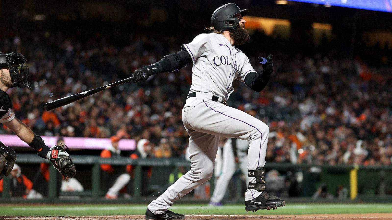 Charlie Blackmon of the Colorado Rockies hits a pinch-hit three-run home run int he sixth inning against the San Francisco Giants at Oracle Park on June 7, 2022.